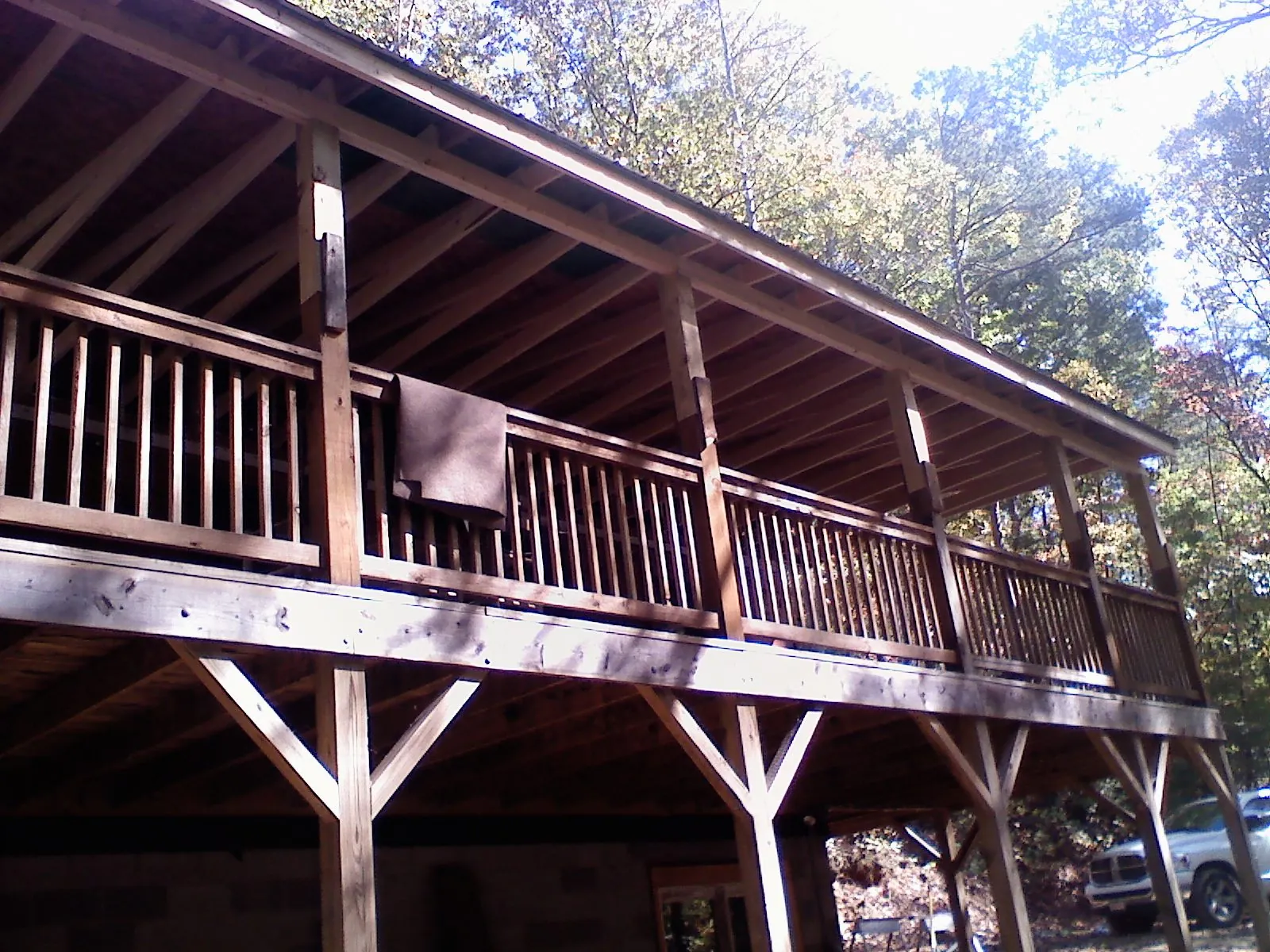 Timber framing under a new elevated porch and deck — Roof Leak Repair in Beaver Meadows by Roofing Brothers